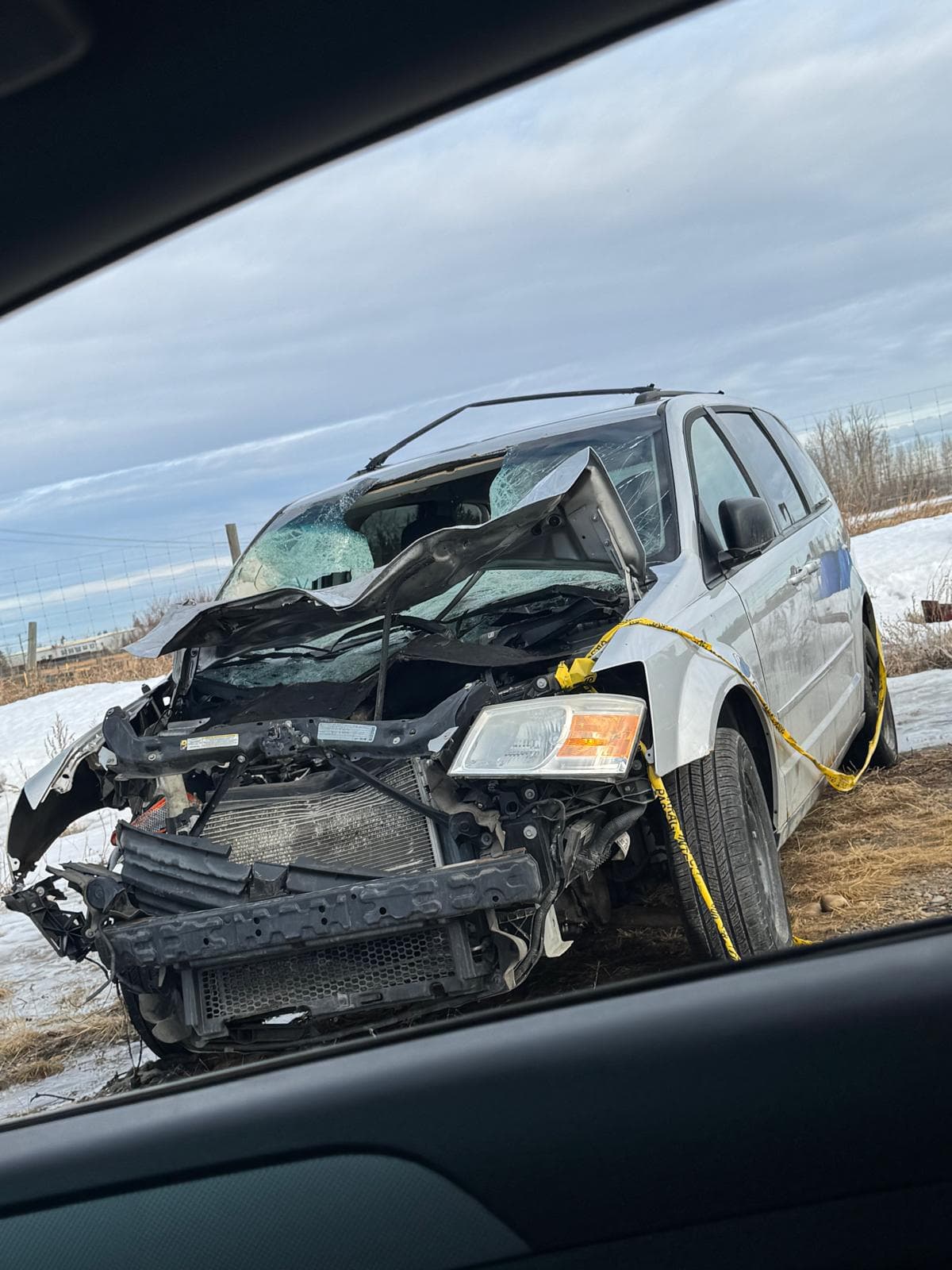 Accident damaged van ready for junk car removal in Calgary